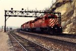 Manifest rolls east behind three SD's